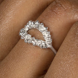 A woman's hand adorned with the Cremilde Bispo Jewellery Laurel Ring.