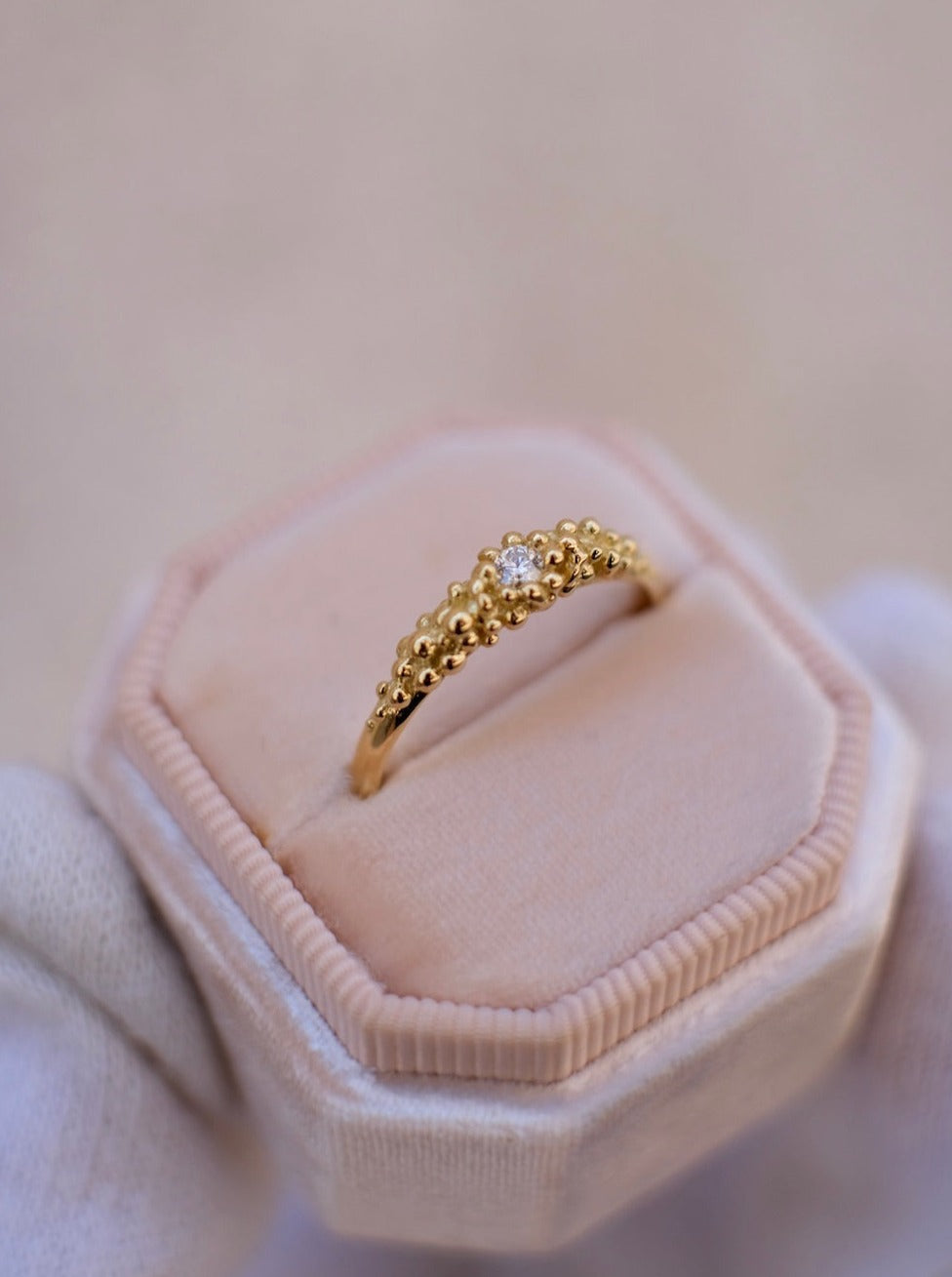 An 18K GOLD Dots Diamond Ring by Cremilde Bispo Jewellery, featuring a diamond set in a gold band.