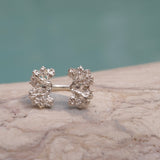 Hand-crafted w/ floral foliage & two Swarovski zirconias, The Garden Ring exudes exquisite artistry. Showcasing nature's beauty, this exclusive & unparalleled piece is a must-have, adjustable to fit any finger.