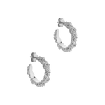 A pair of The Garden Hoops in Sterling silver by Cremilde Bispo Jewellery, with hand-carved nature inspired motifs.