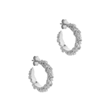A pair of The Garden Hoops in Sterling silver by Cremilde Bispo Jewellery, with hand-carved nature inspired motifs.