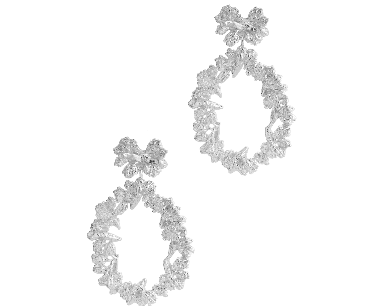 A pair of Cremilde Bispo Jewellery Garden's Delight statement earrings. Handcrafted from sterling silver, these earrings feature meticulously hand-sculpted floral accents and an elegant drop-shaped design that gently sways with grace.