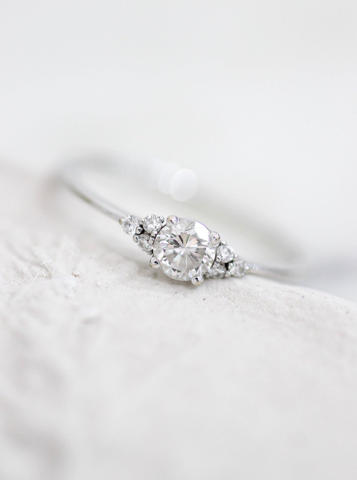 A made-to-order 18k GOLD Hera Diamonds Ring with a diamond in the center by Cremilde Bispo Jewellery.
