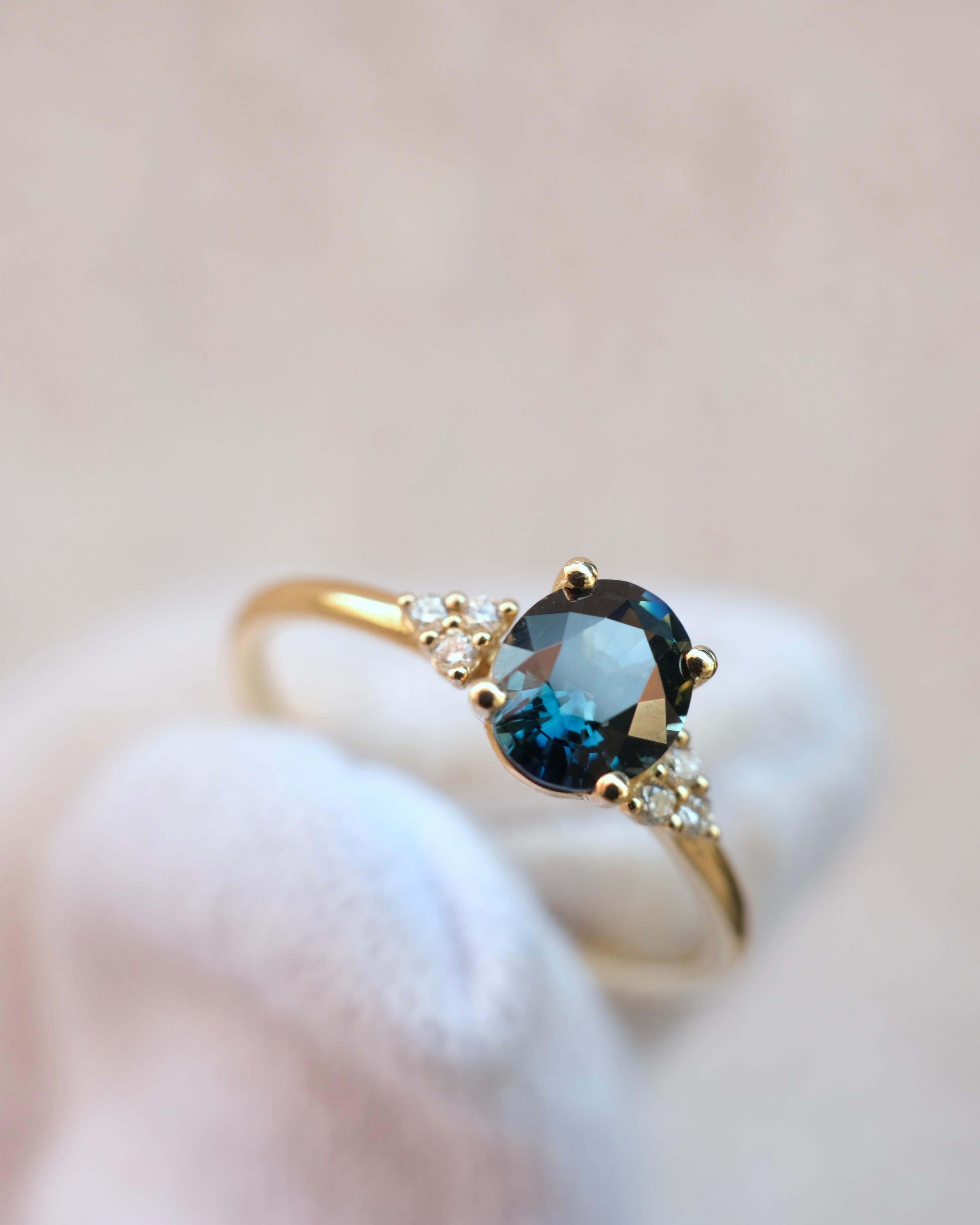 Thetis Oval Cut Australian Sapphire & round Brilliant Cut Diamonds Engagement Ring