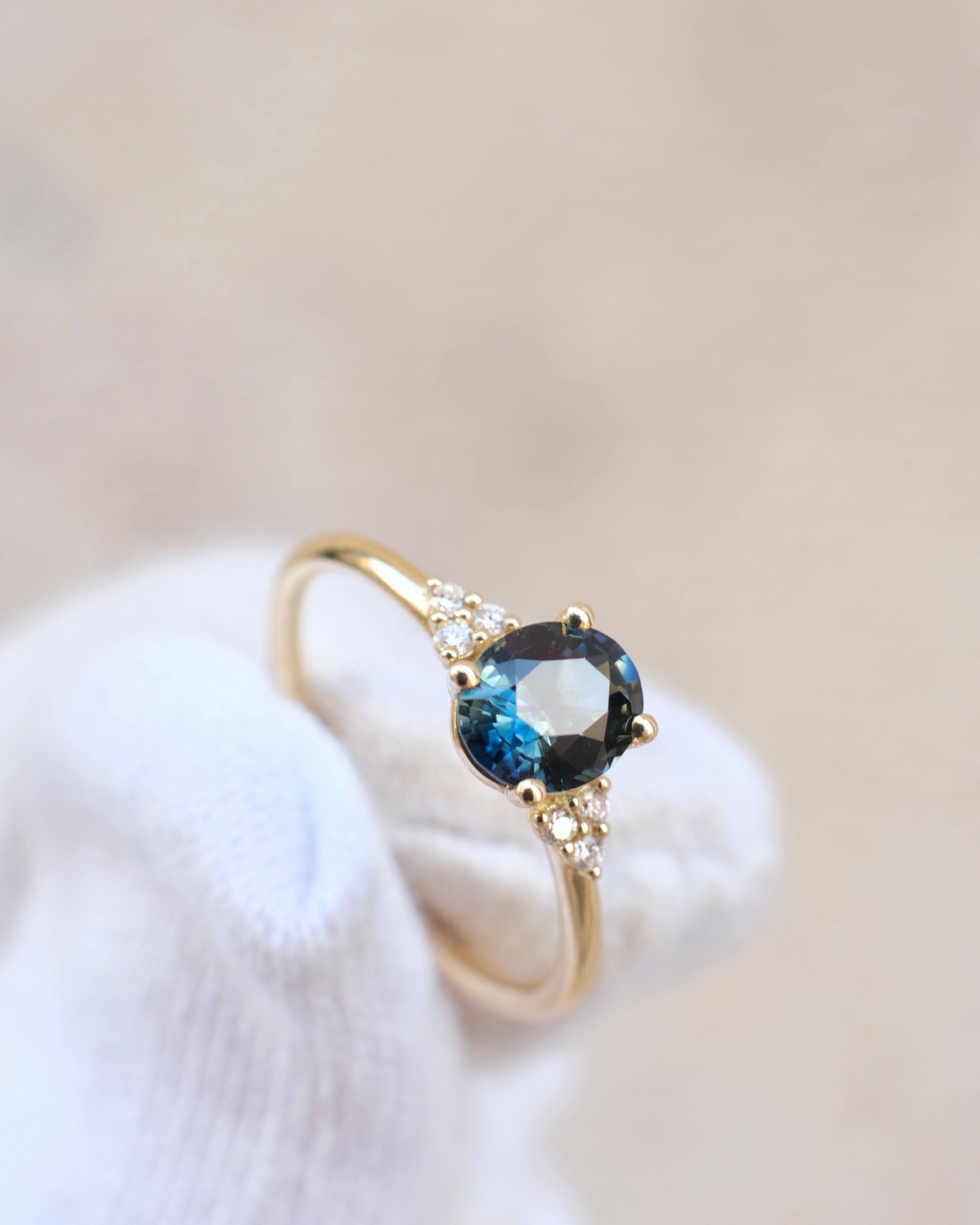 Thetis Oval Cut Australian Sapphire & round Brilliant Cut Diamonds Engagement Ring