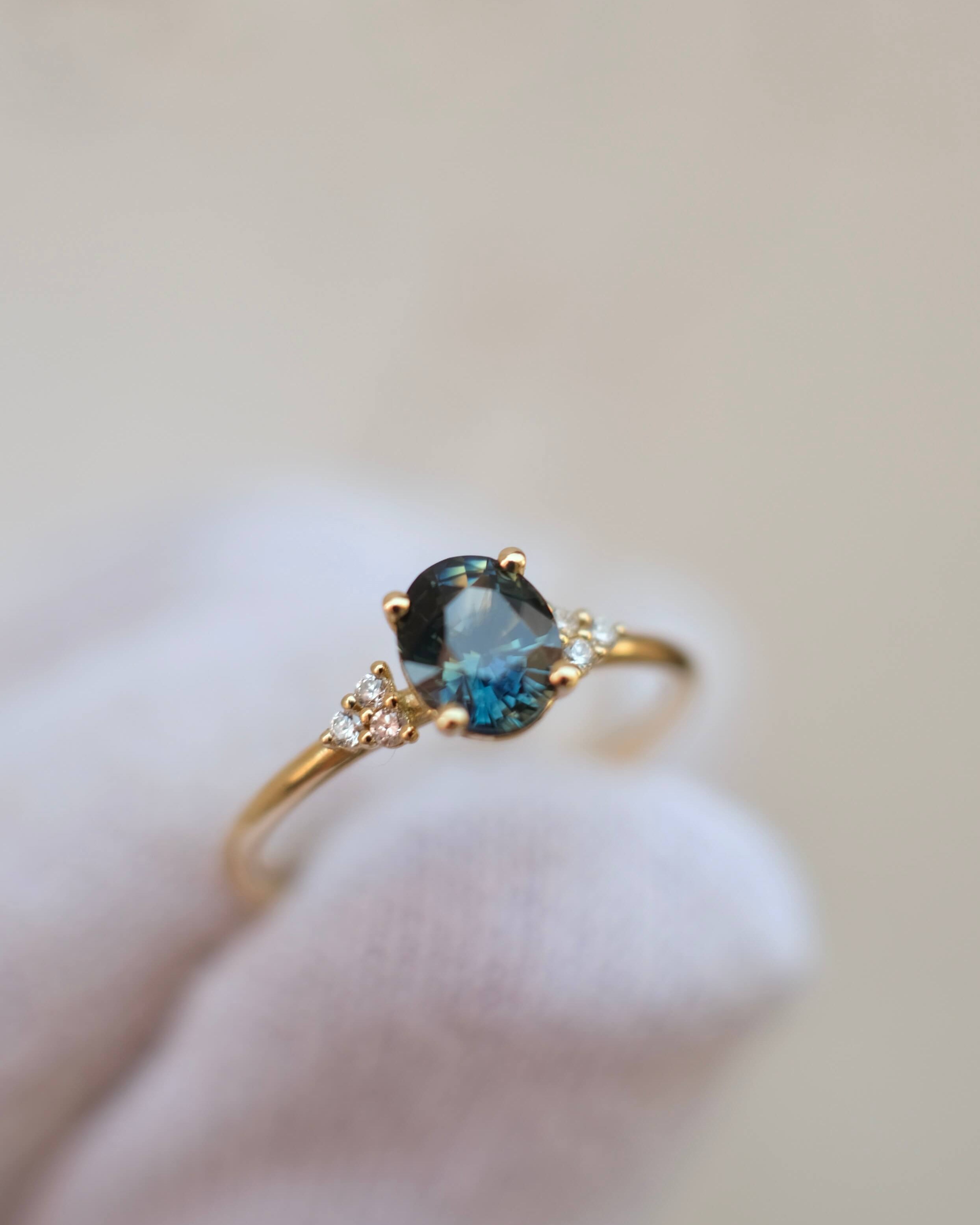 Thetis Oval Cut Australian Sapphire & round Brilliant Cut Diamonds Engagement Ring