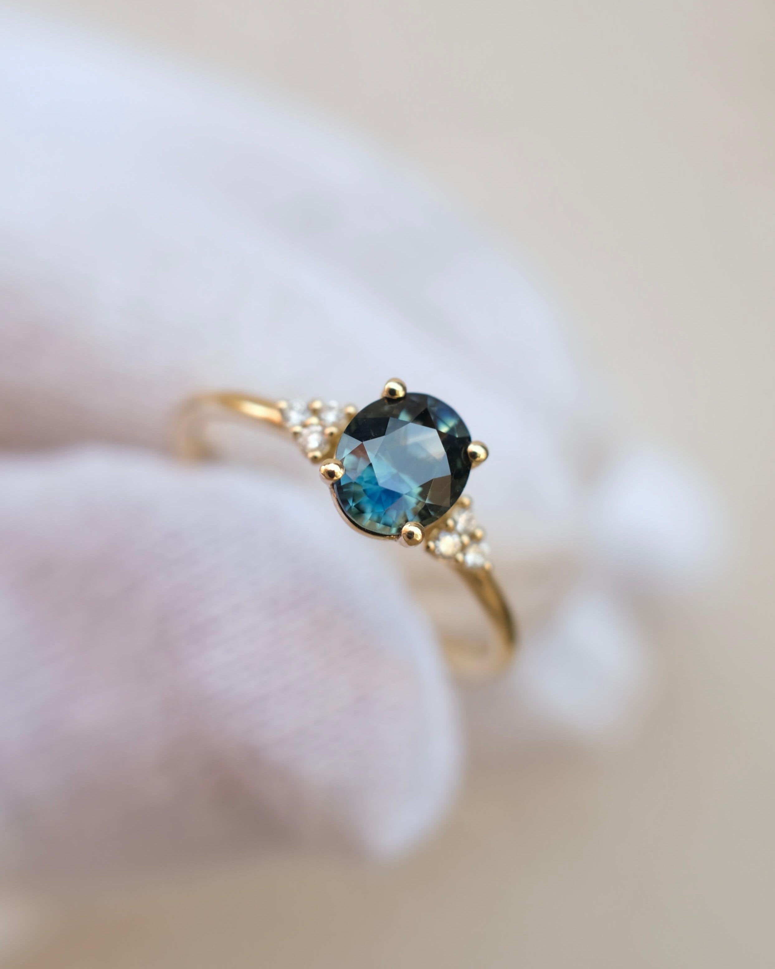 Thetis Oval Cut Australian Sapphire & round Brilliant Cut Diamonds Engagement Ring