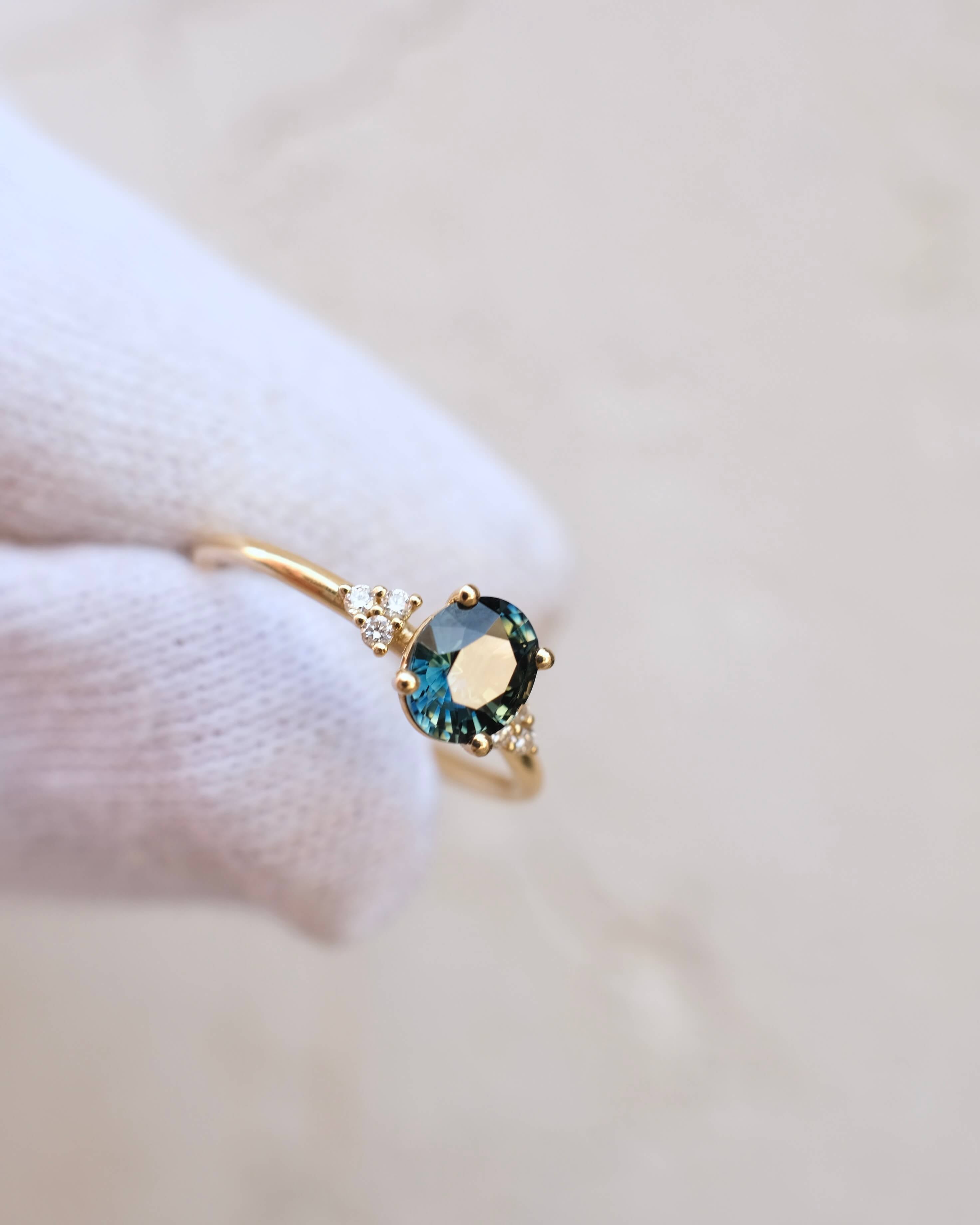Thetis Oval Cut Australian Sapphire & round Brilliant Cut Diamonds Engagement Ring