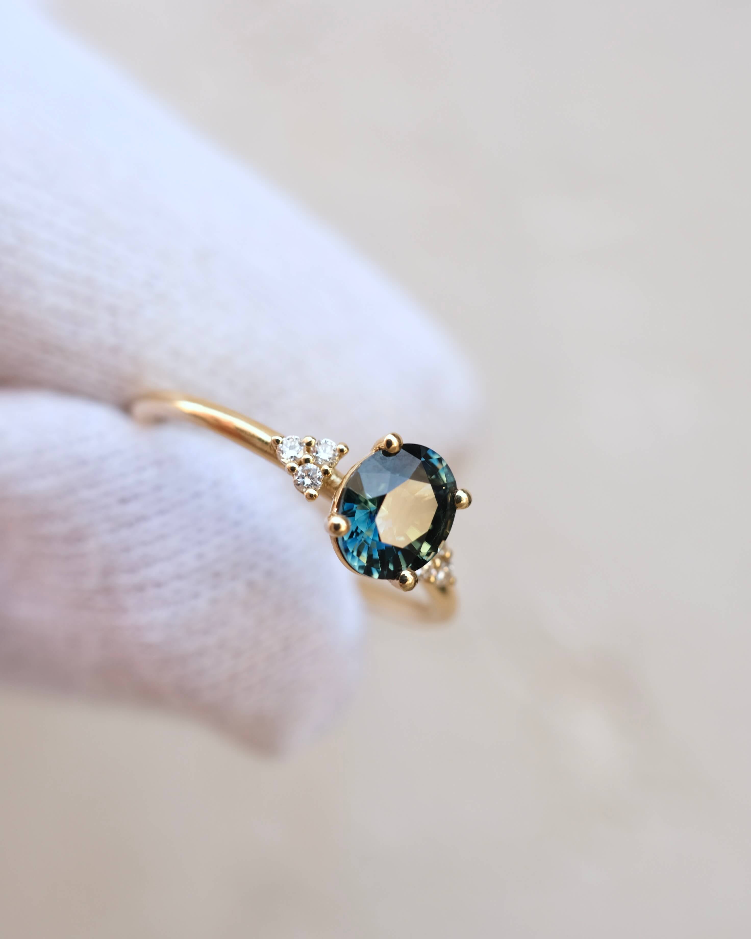 Thetis Oval Cut Australian Sapphire & round Brilliant Cut Diamonds Engagement Ring
