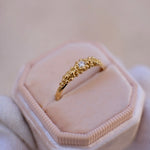 An 18K GOLD Dots Diamond Ring by Cremilde Bispo Jewellery, featuring a diamond set in a gold band.