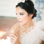 A timeless bride in a handcrafted white dress with a luxurious Cremilde Bispo Jewellery Muse I tiara.