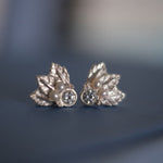 A pair of handcrafted silver leaf stud earrings with luxurious pearls, The Muse I by Cremilde Bispo Jewellery.