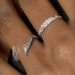 A woman's hand adorned with the timeless elegance of a Cremilde Bispo Jewellery Essential Dot Ring.