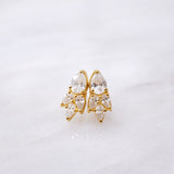 A pair of Essential Drops gold stud earrings with clear crystals from the Cremilde Bispo Jewellery collection.