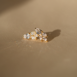 An Essential Drops Earring from the Lisbon jewelry collection by Cremilde Bispo Jewellery, made of gold-plated studs with white diamonds.