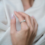 A woman wearing a bespoke engagement ring with a Cremilde Bispo Jewellery 18k GOLD Hera Diamonds Ring.