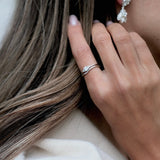 A woman wearing a bespoke Cremilde Bispo Jewellery 18k GOLD Hera Diamonds Ring.